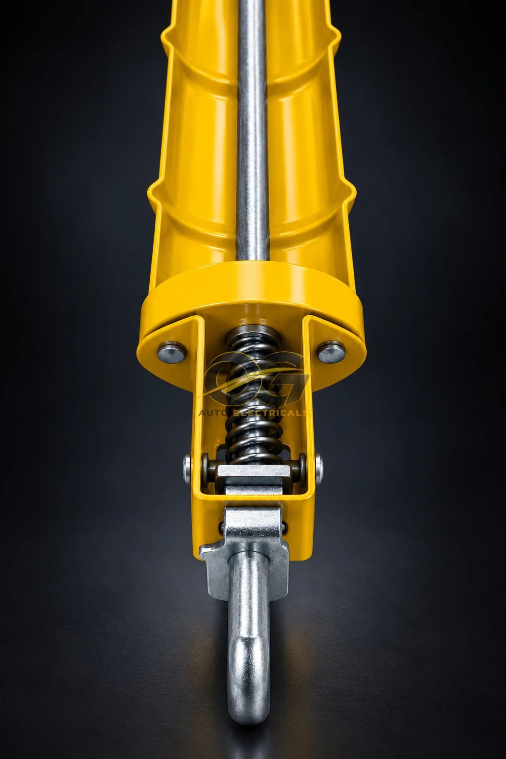 Close-up of the spring and release catch on a caulking gun